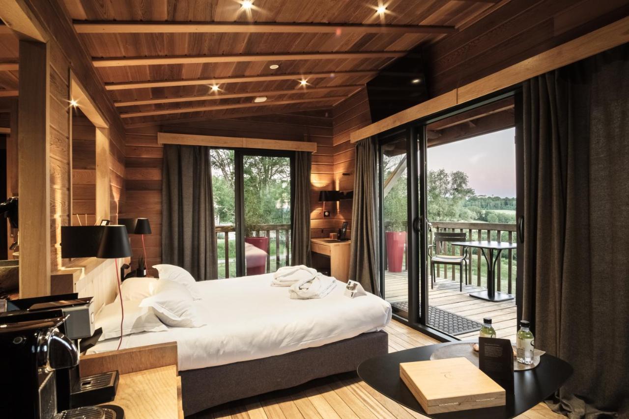Le Domaine Des Pres Verts Suites & Chambres Avec Jacuzzi Privatif Jouey Buitenkant foto